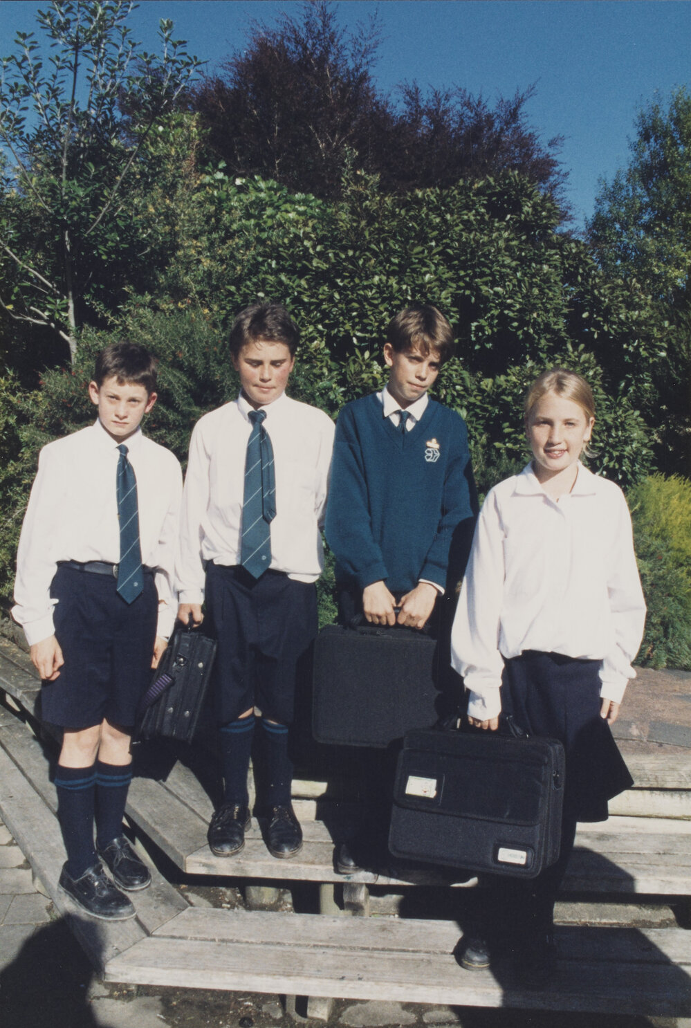 Students holding laptops