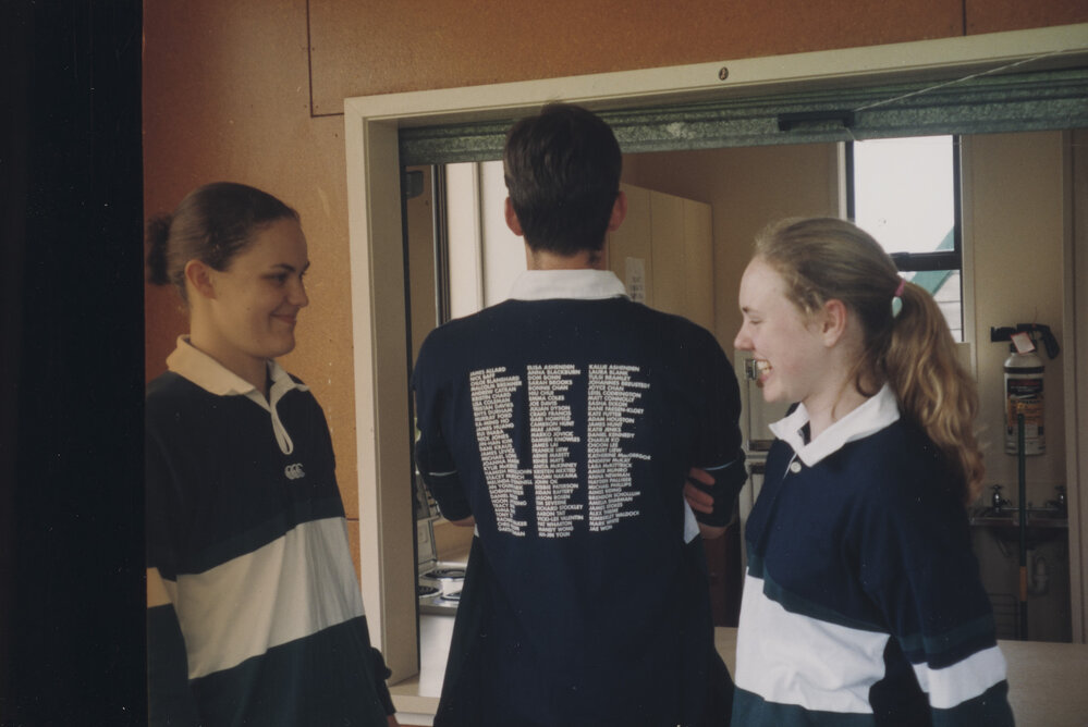 Students modelling rugby shirts