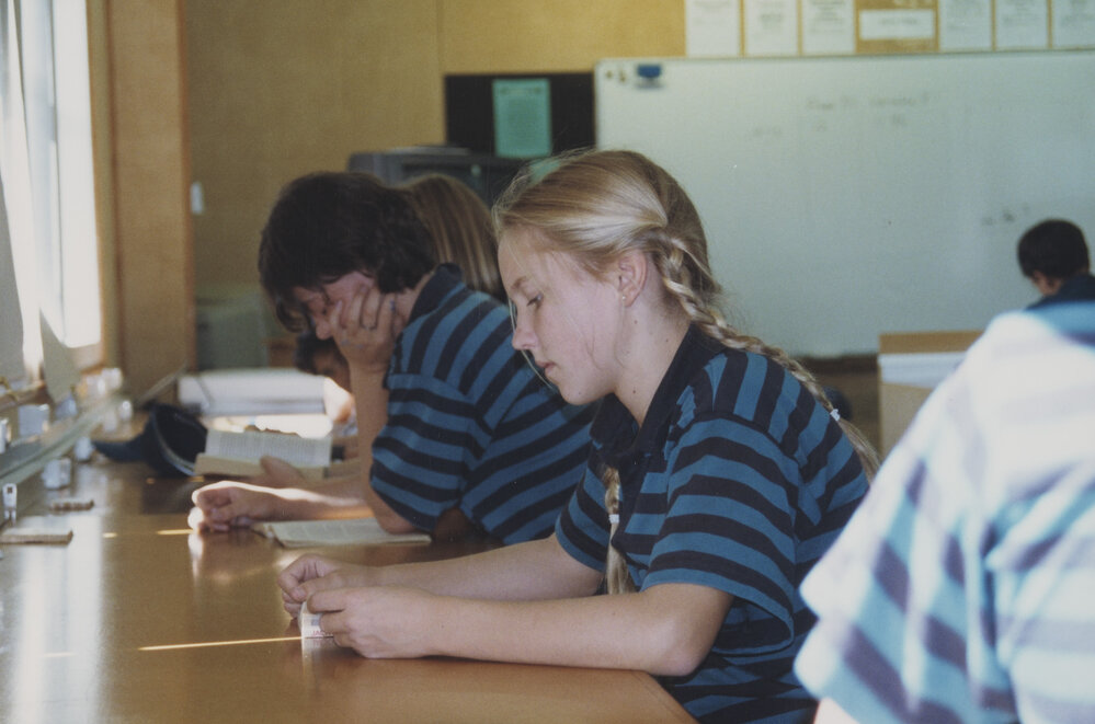Students reading in class