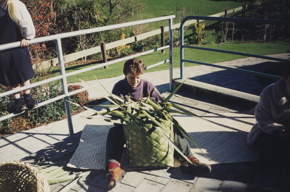 Weaving a kete for Multicultural Festival