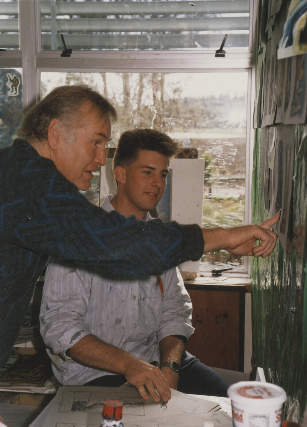 Student and teacher in art classroom