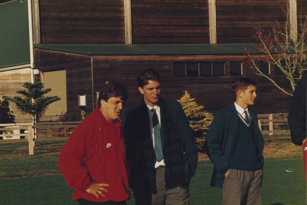 Students and teacher on field