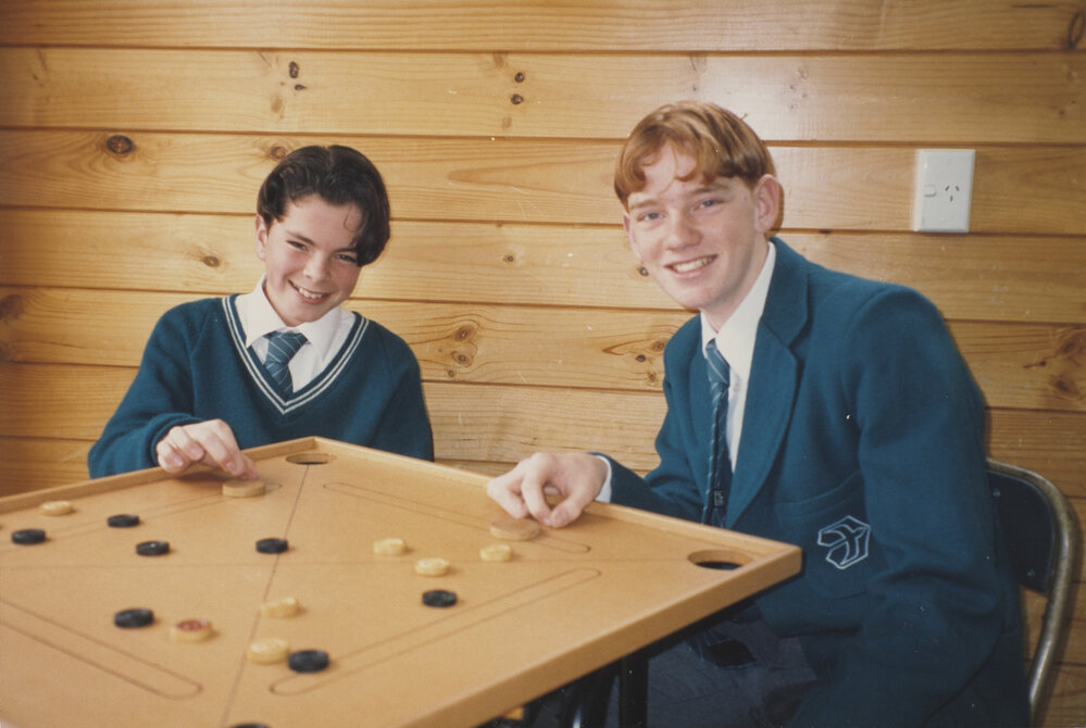 Students playing Carrom