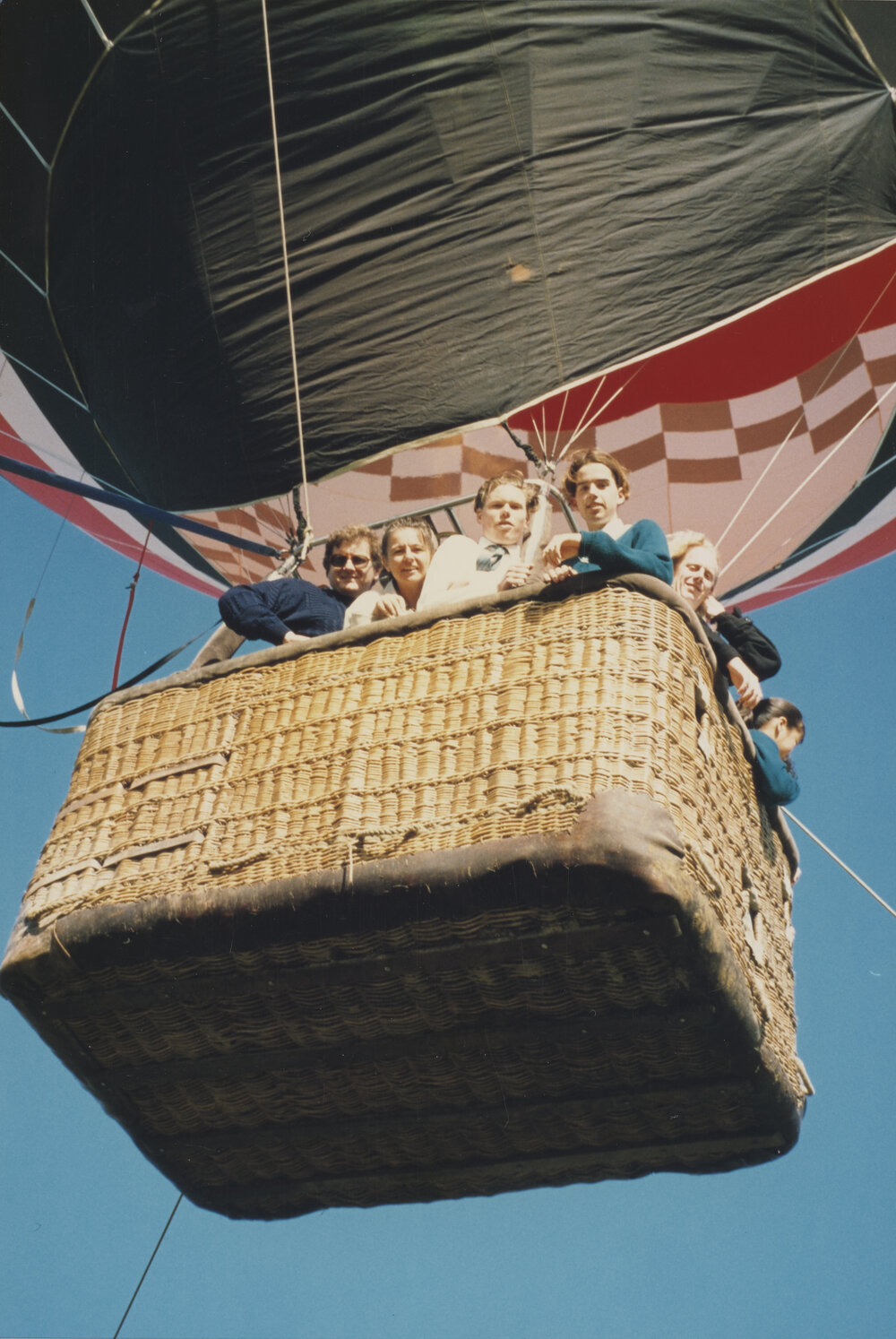 Students and staff in hot air balloon