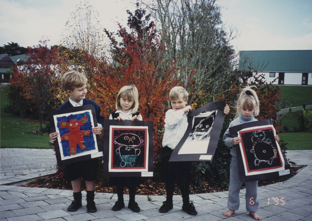 Students with artwork