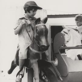 Students on merry-go-round