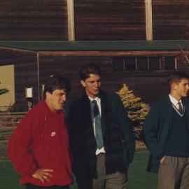 Students and teacher on field