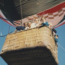 Students and staff in hot air balloon