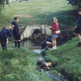 Students collecting water samples