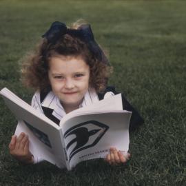 Student posing with Kristin Yearbook