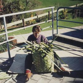 Weaving a kete for Multicultural Festival